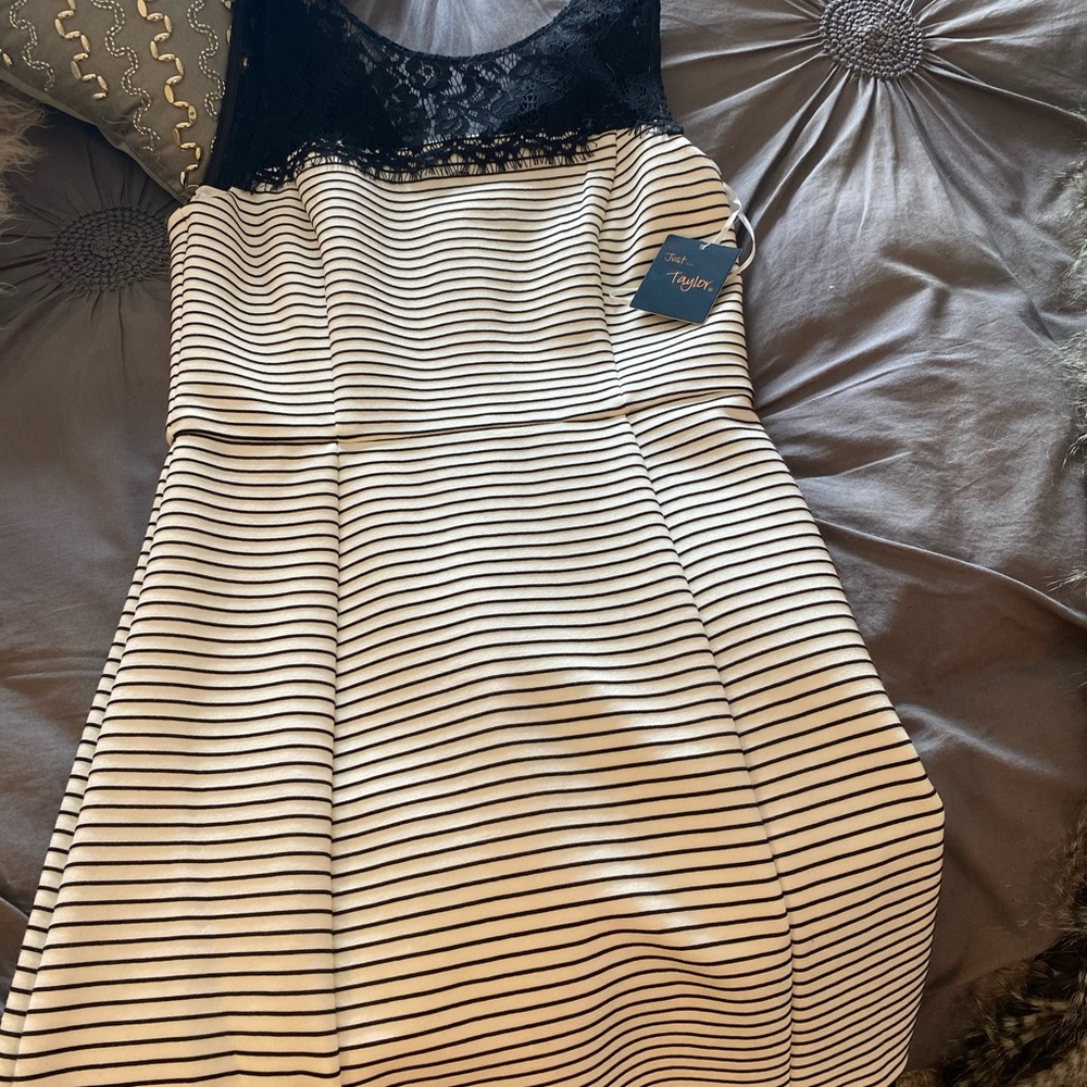 A line black and white dress with black lace